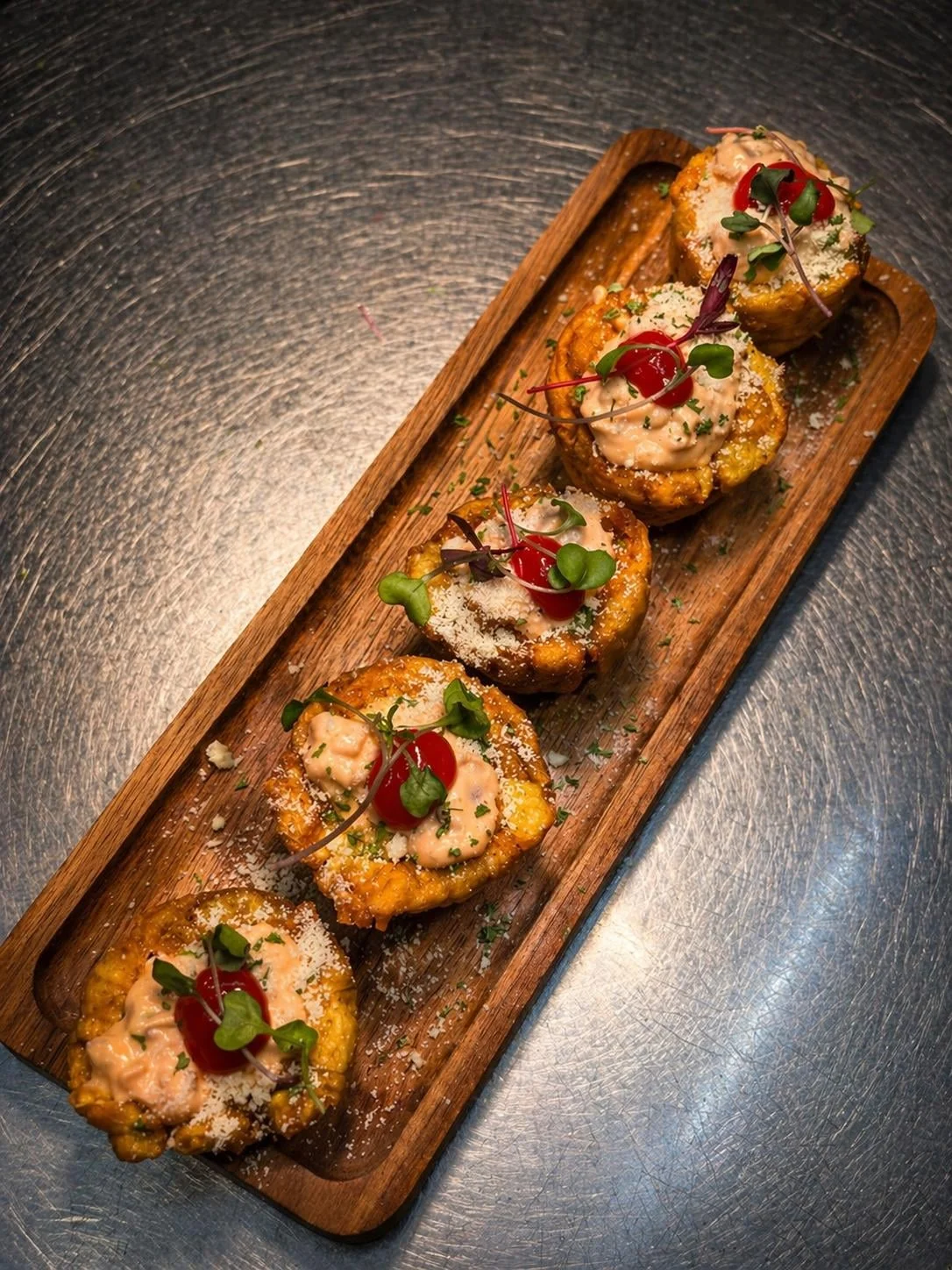 Crispy Caribbean tostones (fried green plantains) at Sensaciones